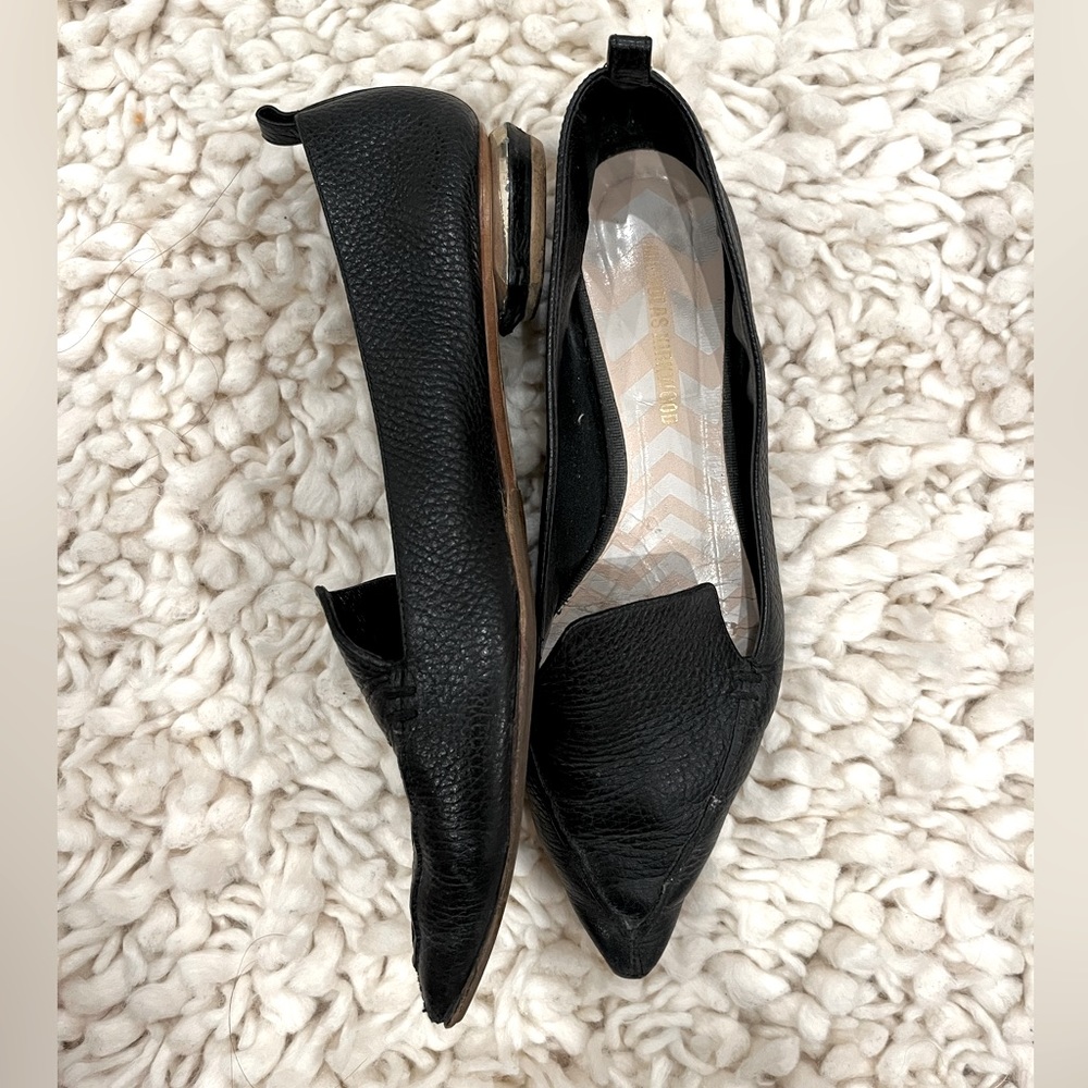 Nicholas Kirkwood black leather flats with gold heel detail